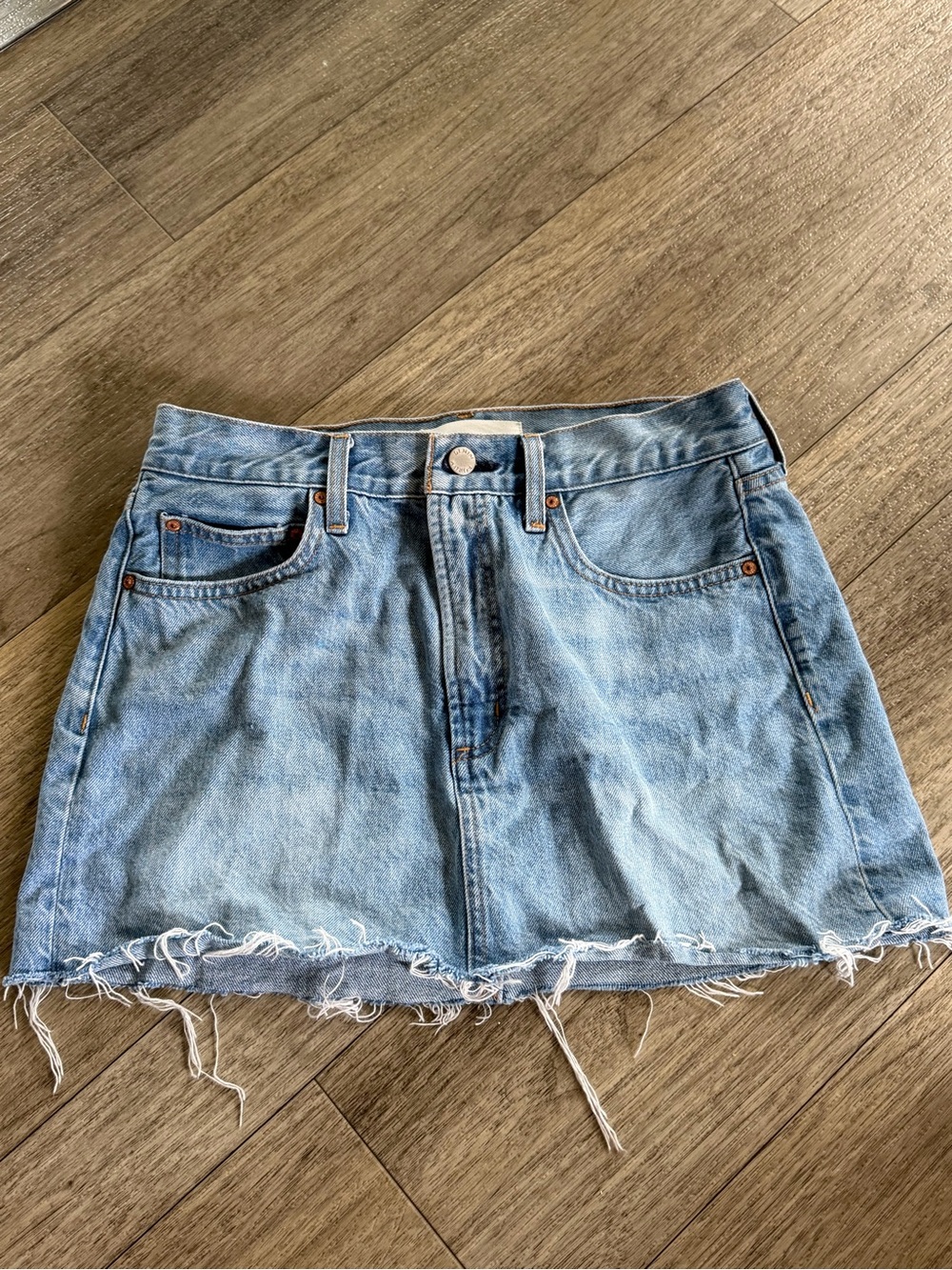 Denim forum Light Wash Denim Mini Skirt with Frayed Hem